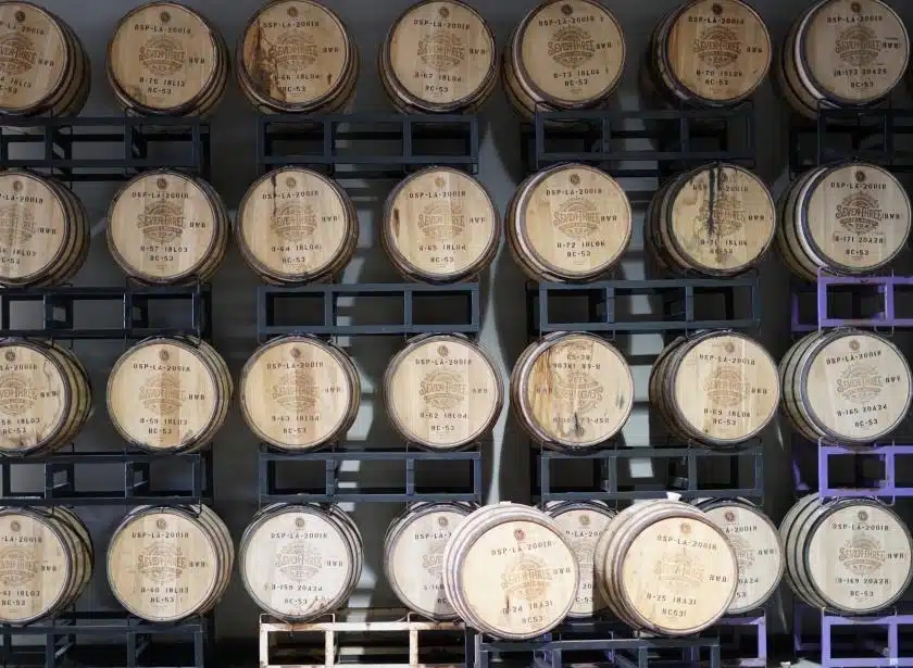 Barrels lined up at Seven Three Distillery