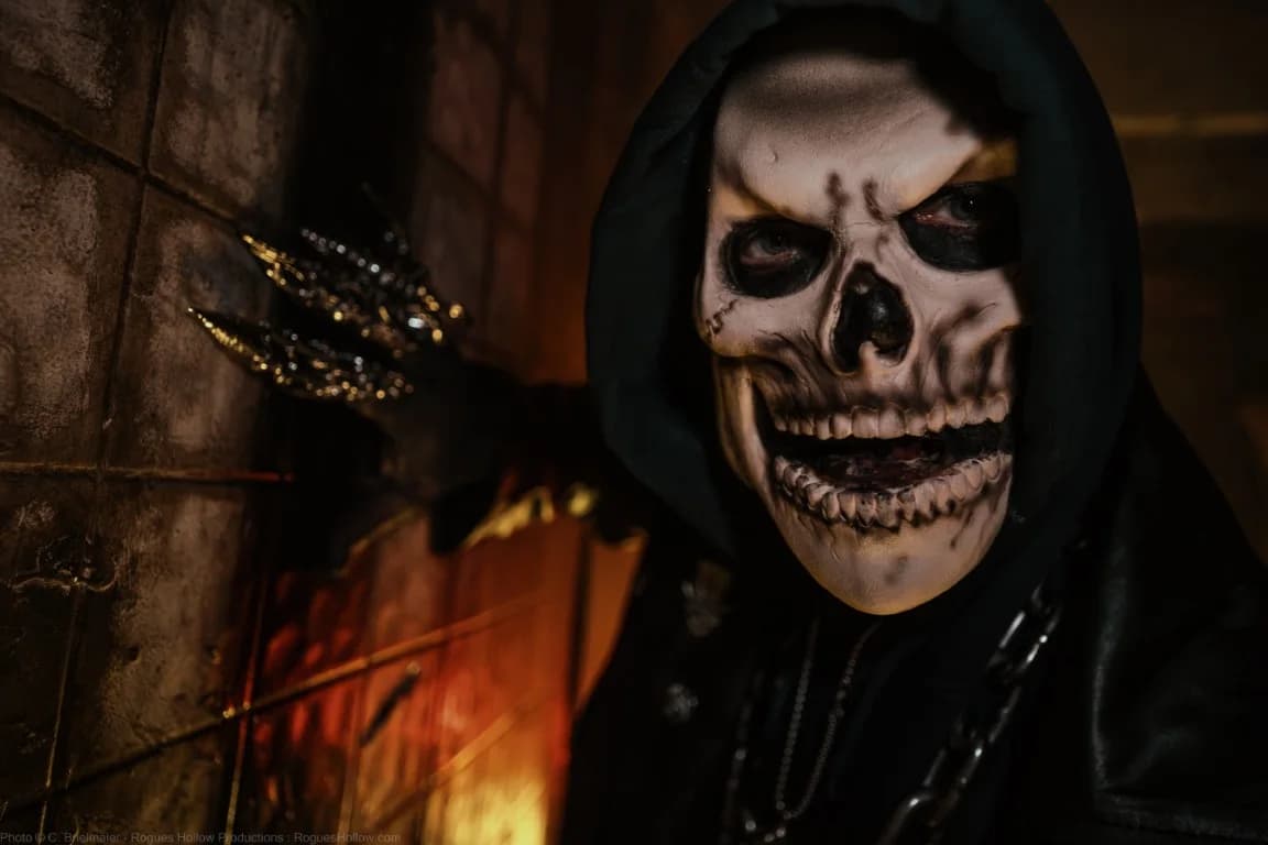 A man dressed as a skeleton for the Mortuary Haunted House