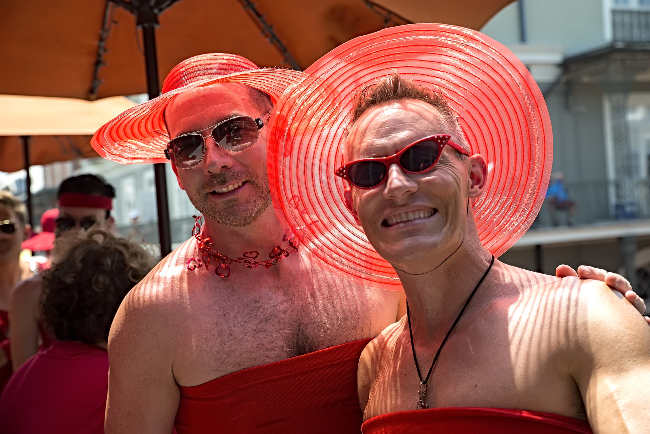 Things to do in New Orleans Red dress Run attendees smiling for the camera