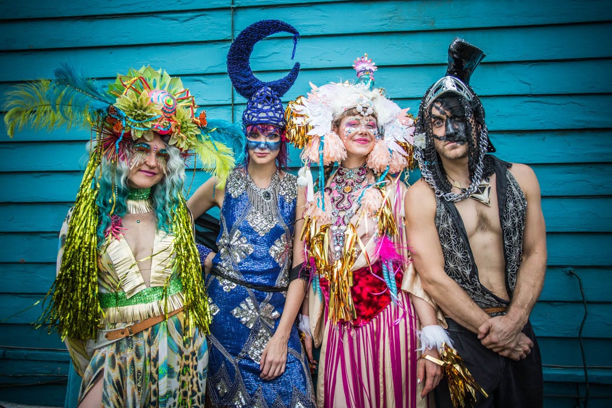 small group of people in new orleans halloween costumes posing for a photo